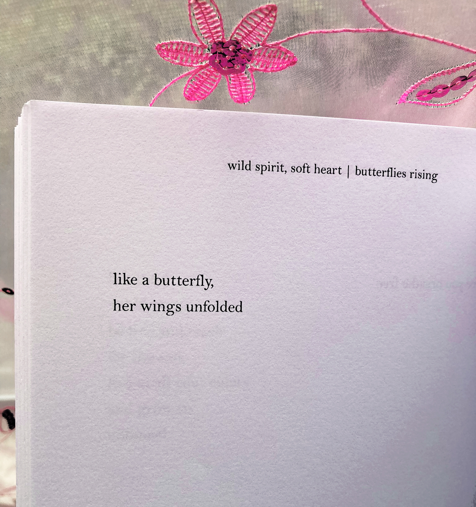 like a butterfly, her wings unfolded
